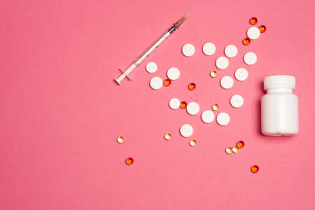 jar, pills, syringe - health concept.の写真素材
