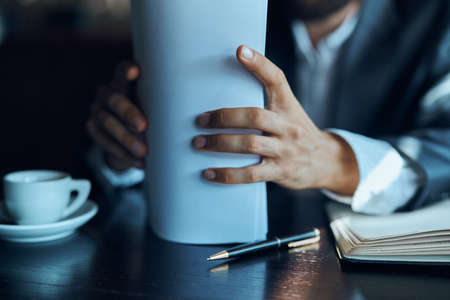 hands, paper, pen, mug.の写真素材