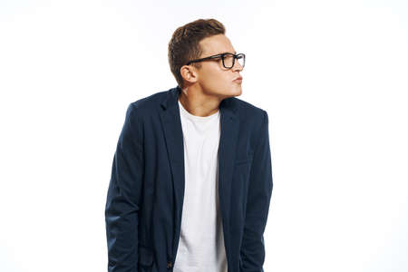 man in jacket posing against white background.の写真素材