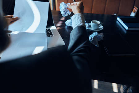 businessman, sheets of paper, crumpled paper.の写真素材
