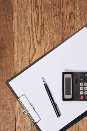 tree, tablet, pen, calculator.の写真素材