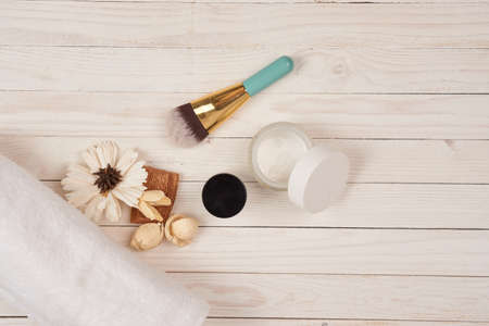 background of boards, flower, brush, jar.の写真素材