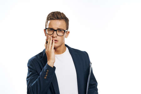 business man in suit covering face.の写真素材