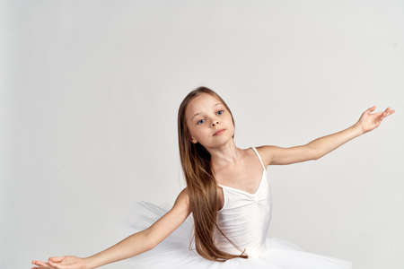 portrait of a small ballerina posing.の写真素材
