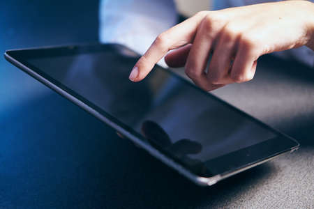 hand, tablet, close-up.の写真素材
