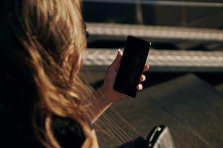 hand, phone, hair, street, close-up.