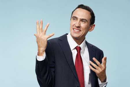 Cheerful business man in a suitの写真素材