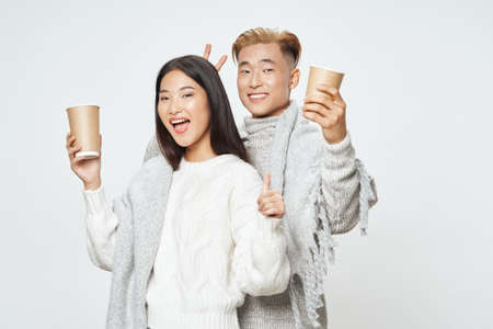 A cheerful young couple of Asian appearance elegant styleの写真素材