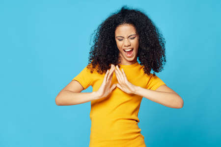 Cheerful national woman curly hair