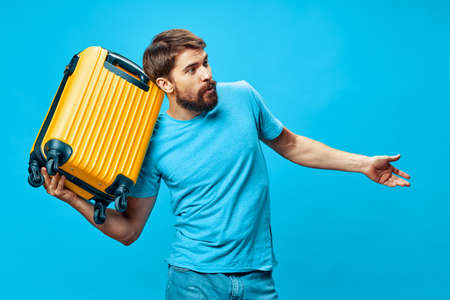 A man came in there with a suitcase travelingの写真素材