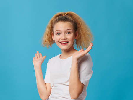 Cheerful girl curly hair smileの写真素材