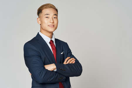 Confident businessman crossed his arms over his chestの写真素材