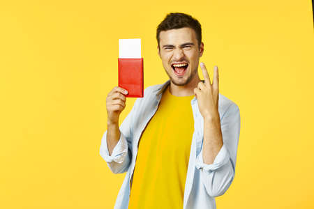 successful man with passport and tickets model
