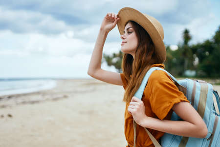 Confident traveler with a backpack nature modelの写真素材