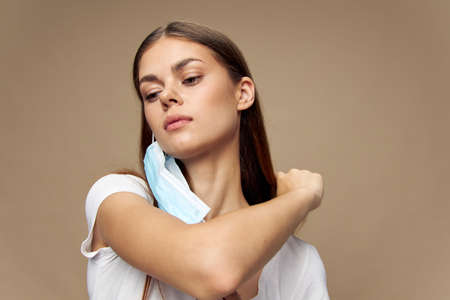 Model in white shirt in a medical mask health