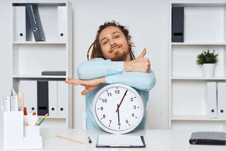Business man working desk office clock waiting