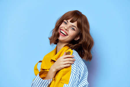 Brunette Fun emotion model yellow coatの写真素材