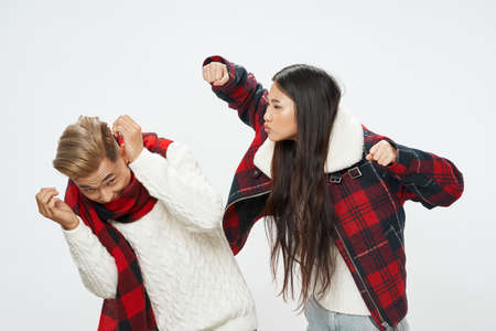 Young couple socializing lifestyle winter studio elegant styleの写真素材