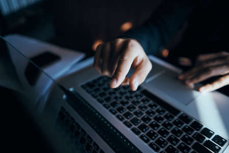 Business man freelancer working in a cafe laptops communication phone room manager modelの写真素材