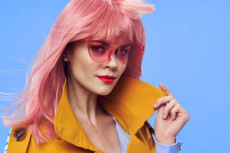 Woman with pink hair glasses red lips elegant glamor style Glamor lifestyle