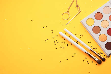 Professional cosmetics palette with eyeshadow makeup brushes cropped lookの写真素材