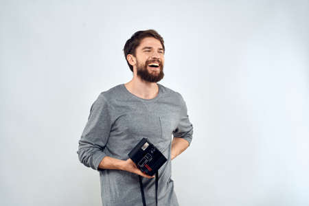 photographer with camera hobby technology studio lifestyle creative light backgroundの写真素材