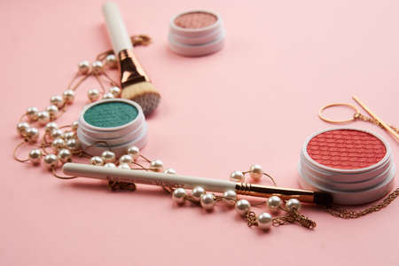 eyeshadow makeup brushes collection professional cosmetics accessories on pink backgroundの写真素材
