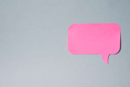 Pink label notification sticker on gray background Copy Spaceの写真素材