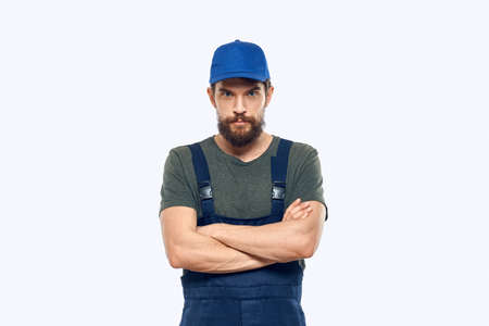 Worker man uniform delivery service emotions studio light background