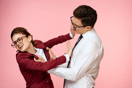 business man and woman office work colleagues team office management studio pink background