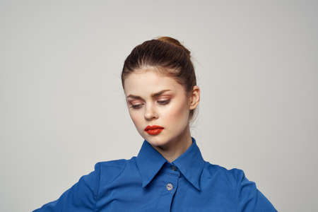 Women in blue shirt emotions fun romance glasses model cropped viewの写真素材