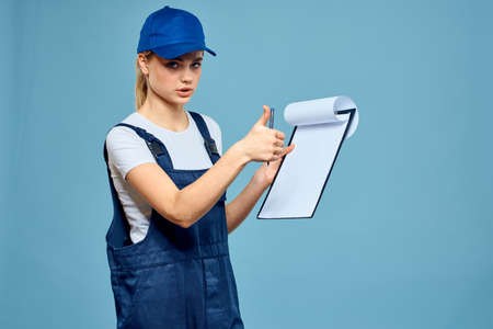 Woman in working form paperwork rendering services career office blue background