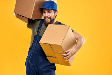 working man with box in hands delivery loading transportation service