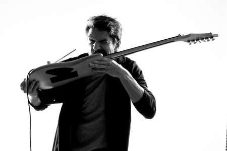 Musician with guitar rock star emotions entertainment modern performer