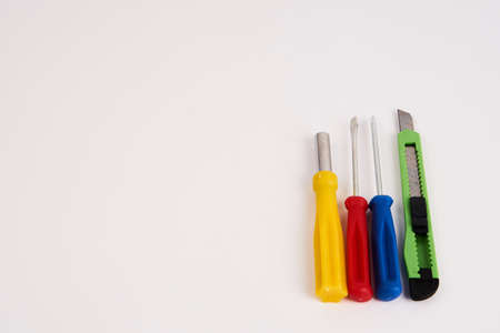 construction tools screwdrivers on a light background equipment for repair industry