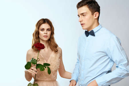 man giving woman roses relationship charm lifestyle embrace lifestyleの写真素材