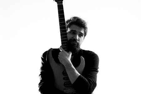 Male musician with guitar rock star performing entertainment program