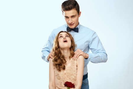 man giving woman roses relationship charm lifestyle embrace lifestyle