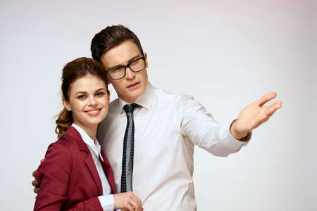 Work colleagues Business couple office officials team studio light background