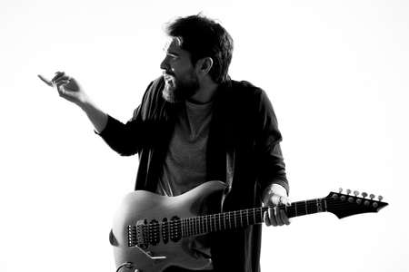 Musician with guitar rock star emotions entertainment modern performerの写真素材