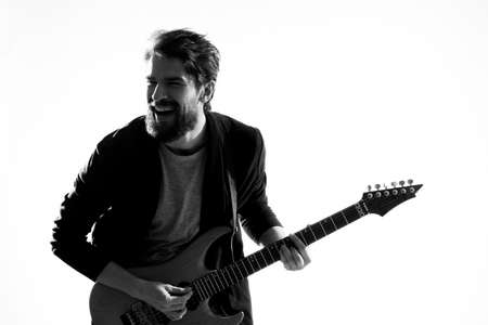 Musician with guitar rock star emotions entertainment modern performerの写真素材