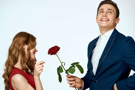 cute man and woman dating relationship red rose lifestyle romance