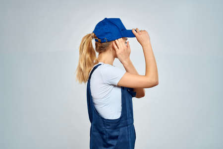 Working woman in uniform courier deliveryの写真素材