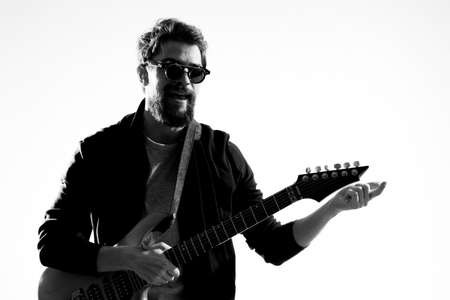 Musician with guitar rock star emotions entertainment modern performerの写真素材
