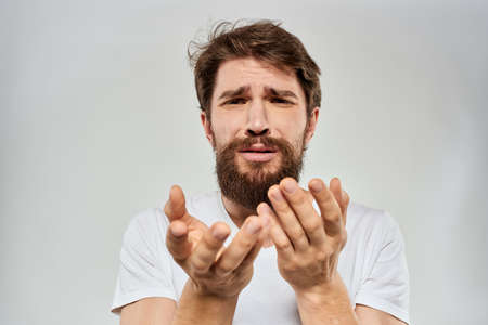 emotional bearded man close-up facial expression studio lifestyleの写真素材