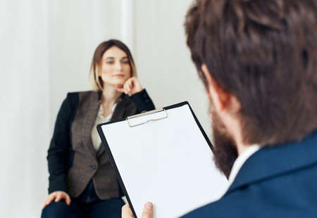 Woman for job interview and business man with documents of employee communication