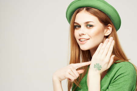 holiday Saint Patricks Day shamrock girl fun Green clothing light backgroundの写真素材