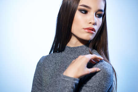 Beautiful brunette bright makeup close-up attractive lookの写真素材