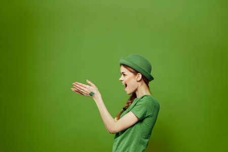 st patricks day happy woman gesturing with her hands hat shamrock holidays funの写真素材