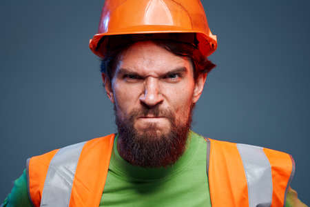 Angry worker in construction forum emotions cropped view autumn backgroundの写真素材